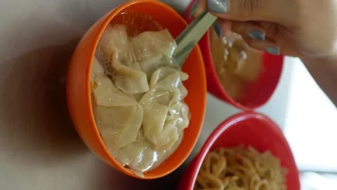 Close up view of Pangsit ayam rebus, boiled chicken dumpling soup with chic.. Stock Footage 294280415