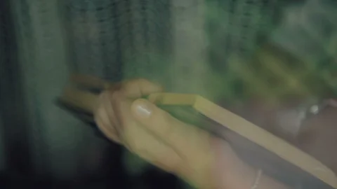 Close up view of paper book in hands of beautiful young girl who read on the Vídeo Stock 86118895