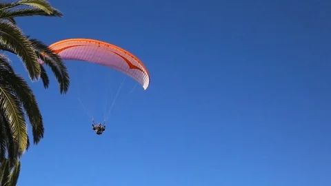 Close up view of Paraglider flying on Balcon de Europa Nerja Stock Footage 101424136