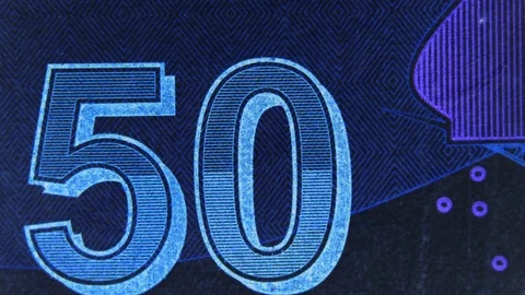 Close view of a part of banknotes, sequence of macro images. Partial view of  Stock Footage 125555116