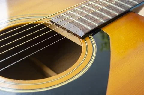 Close up view of part of Guitar suitable for music cover or use for copy sp.. Stock Photos