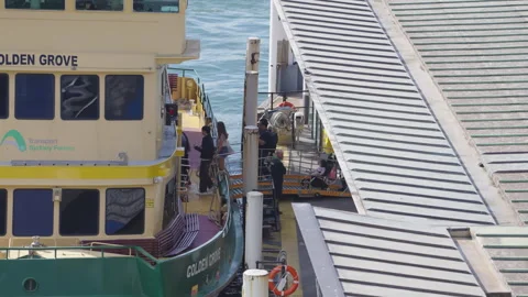 Close-up view of passengers boarding a ferry at Circular Quay wharf in Sydney Stock Footage 251718470
