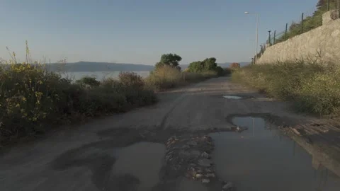 Close up view of a pathway on edge of sea Stock Footage 310946395