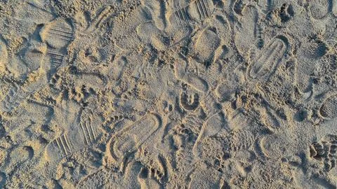 Close view of patterned sand on tropical beach Stock Photos