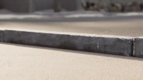 Close view of a pavement section showing concrete blocks and texture Stock Footage 345062028