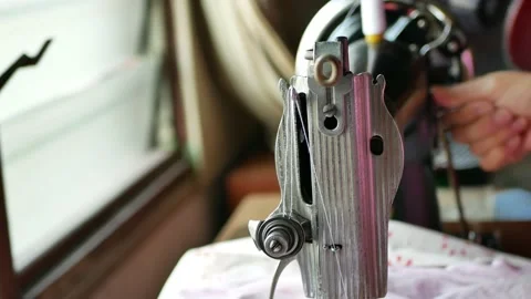 Close-up view of the person working on a sewing machine Видео 167444789