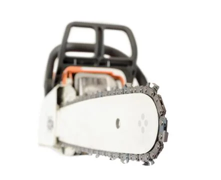 Close up view of petrol chainsaw. Different focus on right side. Isolated on  Stock Photos