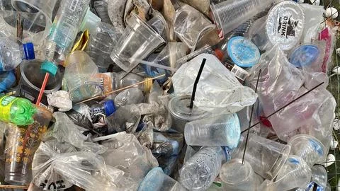 Close-up view of a pile of discarded plastic waste Stock Photos