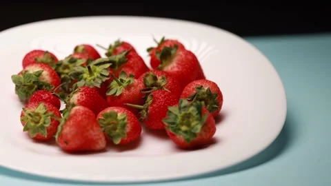 Close up view of a pile of strawberries Stock Footage 166403897