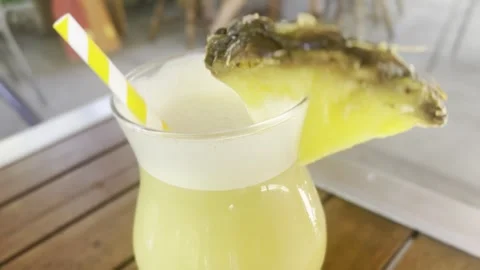 Close Up View of Pina Colada Cocktail with Pineapple Garnish Vídeos de archivo 342029932