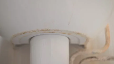 A close-up view of a pipe fitting with signs of corrosion and wear. 스톡 동영상 337101384