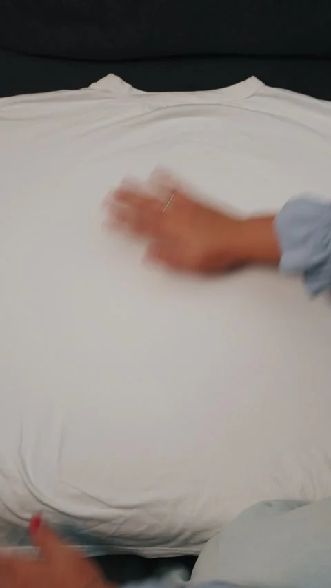 A close-up view of a plain white fabric. Stock Footage 327463745