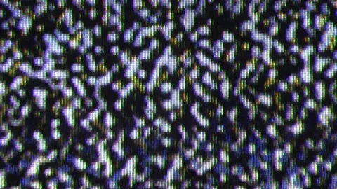 Close up view at a plasma tv while showing white noise activity. Stock Footage 150028316
