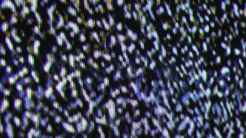 Close up view at a plasma tv while showing white noise activity. Stock Footage 150028412