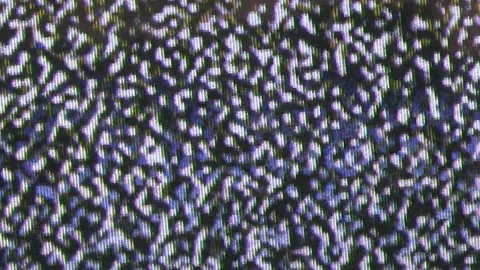 Close up view at a plasma tv while showing white noise . Stock Footage 155557396