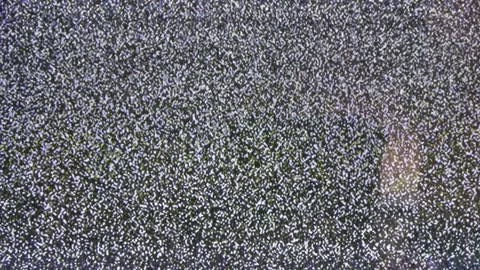 Close up view at a plasma tv while showing white noise . Stock Footage 155557516