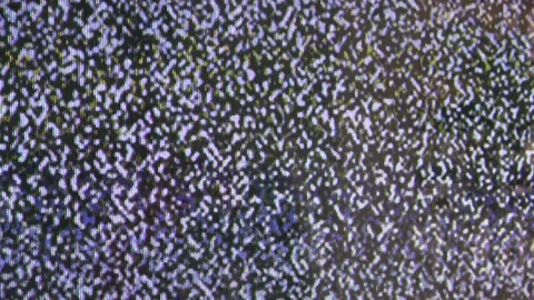 Close up view at a plasma tv while showing white noise . Stock Footage 155557571