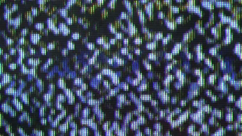 Close up view at a plasma tv while showing white noise . Stock Footage 155557604