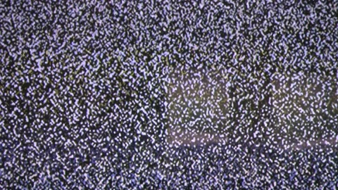 Close up view at a plasma tv while showing television white noise. Stock Footage 205204677