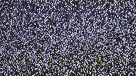 Close up view at a plasma tv while showing television white noise. Stock Footage 205204821
