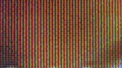 Close up view at a plasma tv while showing television activity. Stock Photos