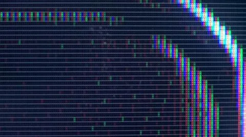 Close up view at a plasma tv while showing television activity. Stock Photos