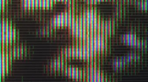 Close up view at a plasma tv while showing television activity. Stock Photos