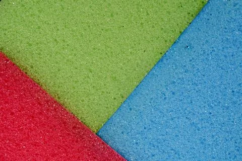 Close View Of Playfully Arranged Sponge Segments With Vivid Hues Stock Photos