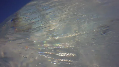 Close up view on polished glazed ice surface, sunlight shine, frozen texture Vidéo 165148757