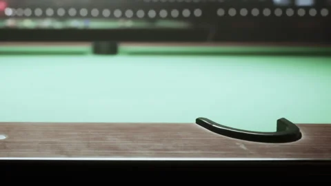 Close view of a pool table with green felt and wooden edge Stock Footage 345061767