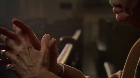 Close view of praying man's folded hands and bowed head Stock Footage 59547841