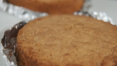 Close up view of prepared sponge-cakes on table Video stock 108331103