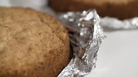 Close up view of prepared sponge-cakes on table Stock Footage 111154359