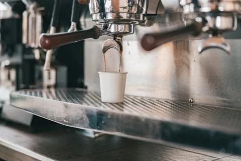 Close up view of preparing coffee espresso in automatic coffee machine in cafe Stock Photos