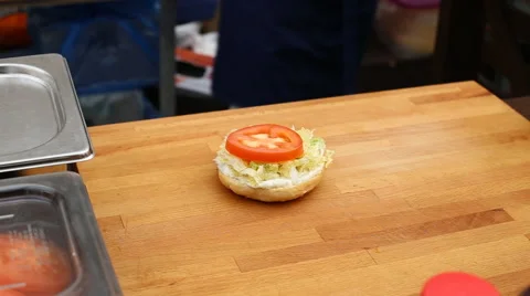 Close up view of preparing a delicious hamburger Stock Footage 62113248
