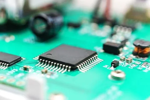 Close view of printed circuit board with electronic parts in a device Foto stock