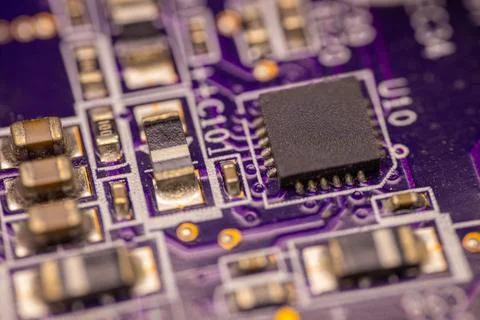 Close-up view of a printed circuit board featuring various electronic compo.. Stock Photos