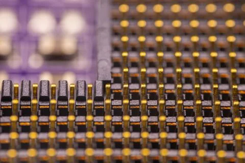 Close-up view of a printed circuit board with intricate patterns of metalli.. Stock Photos