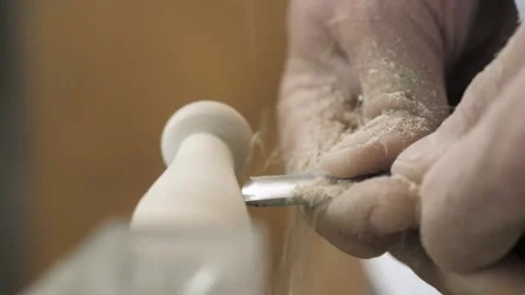Close up view - professional man carpenter using chisel for shaping piece of  Stock Footage 139446622