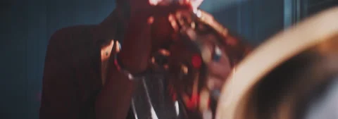 Close up view of a professional trumpeter playing Stock Footage 202309392