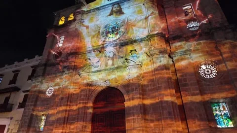 Close Up View of Projection Mapping Light Art on San Pedro Claver Church Facade Stock Footage 340857425