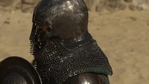 Close up view to the protective helmet of armored warrior Stock Footage 100149426