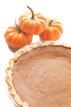 Close up view of pumpkins and pumpkin pie Stock Photos