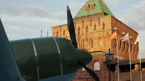 A close up view on the pursuit plane, fighter with a red star monument, Kremlin Stock Footage 148209824