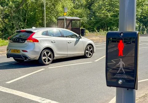 Close up view of the push button operating panel on a pedestrian crossing Stock Photos