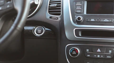 Close-up view of pushing start stop engine button in car Stock Footage 37615927