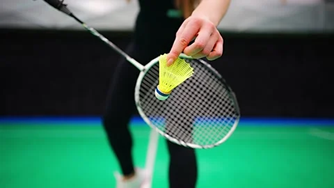 Close up view of racket and shuttlecock, practicing serve before playing in 스톡 동영상 277639887