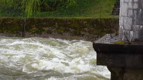 Close up view of raging water flows through the floodgate Stock Footage 226833462