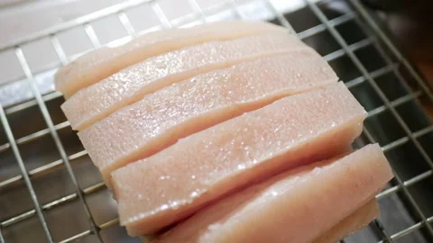 Close up view to raw boild crispy pork while place to dry and preparing to .. Stock Footage 228861462