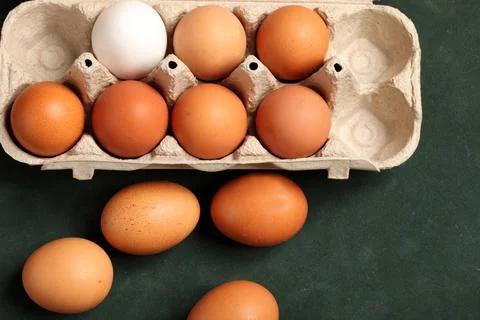 Close-up view of raw chicken eggs in box, egg white, egg brown Stock Photos
